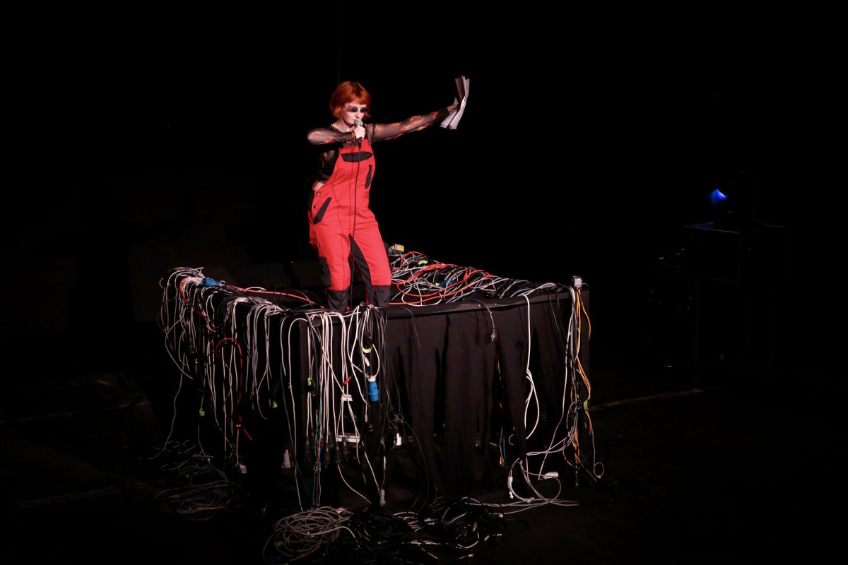 Performing person with sunglasses on